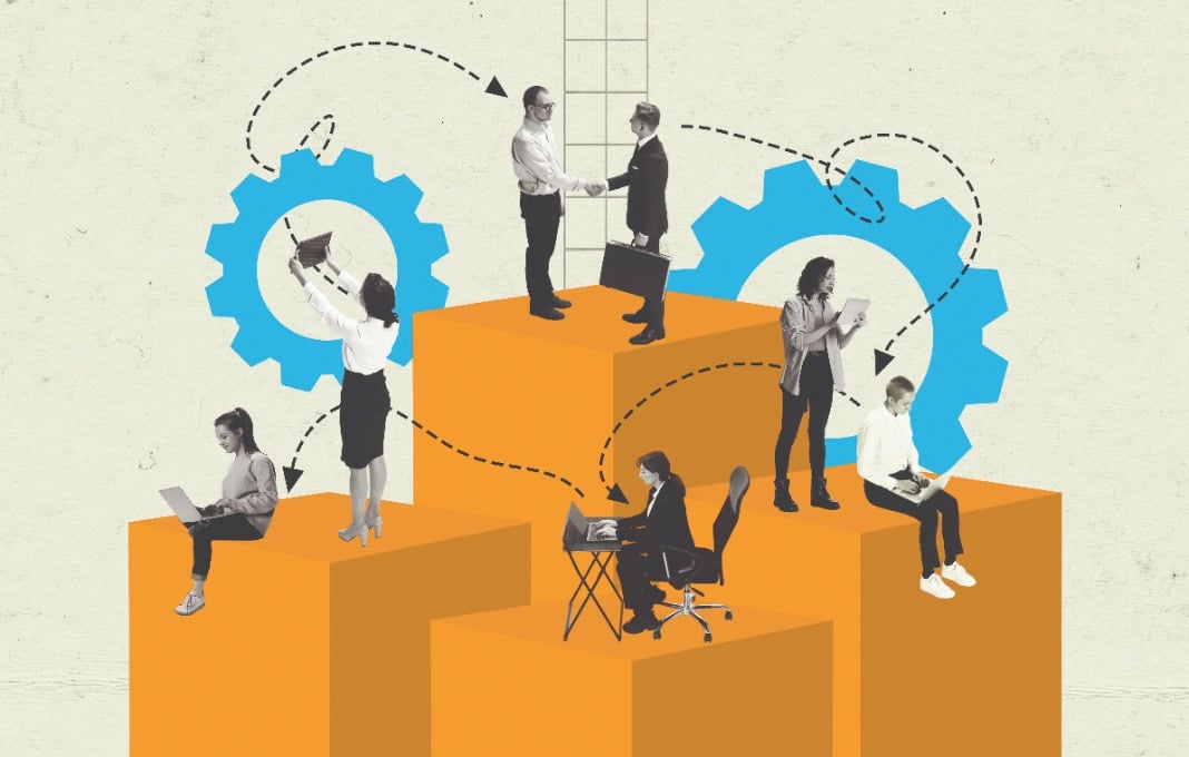 Business people working on illustrated columns with gears and arrows overlayed