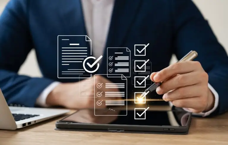 businessman using tablet and laptop Online survey filling out, digital form checklist, blue background.