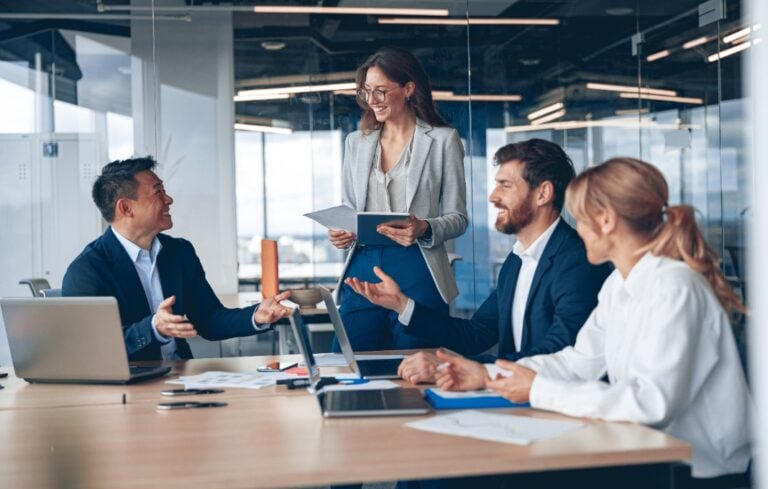 A group of business people partners during a set team meeting in the modern office.