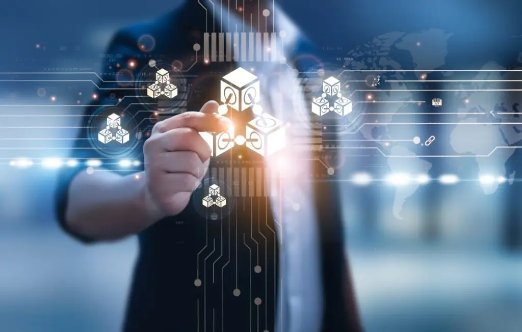 Businessman hand hold blockchain technology icons on digital screen