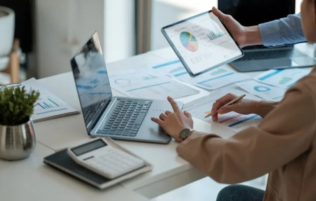 Business people are meeting for analysis data figures to plan business strategies.