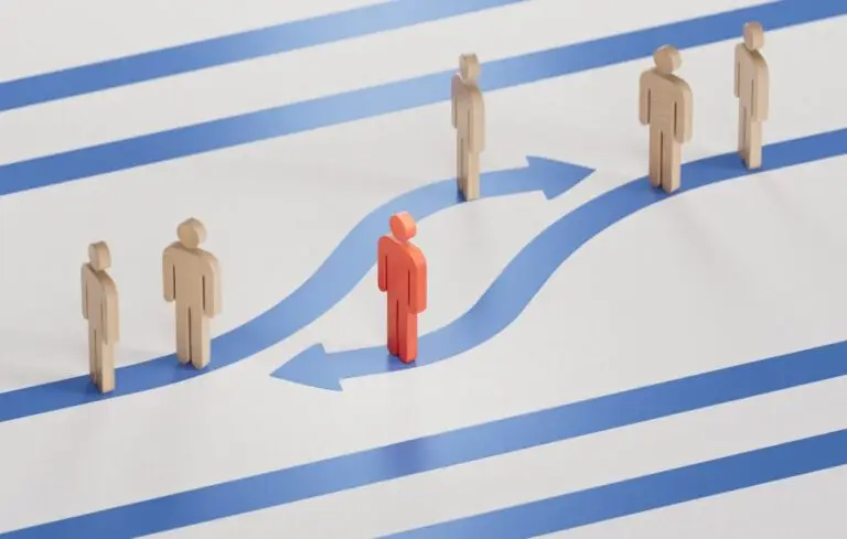 Red and white Wooden dolls with blue arrows.