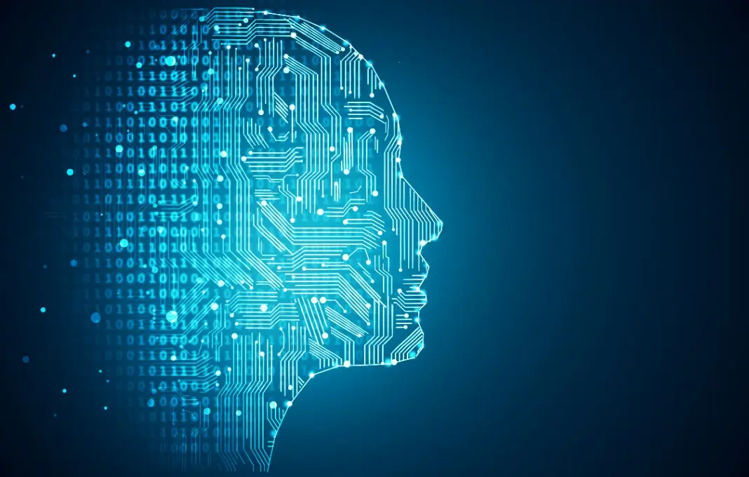 Outline of a person's face made out of circuit imagery