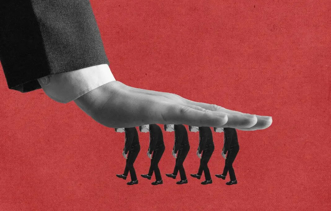 Giant hand pressing down on walking businessmen in abstract control collage.