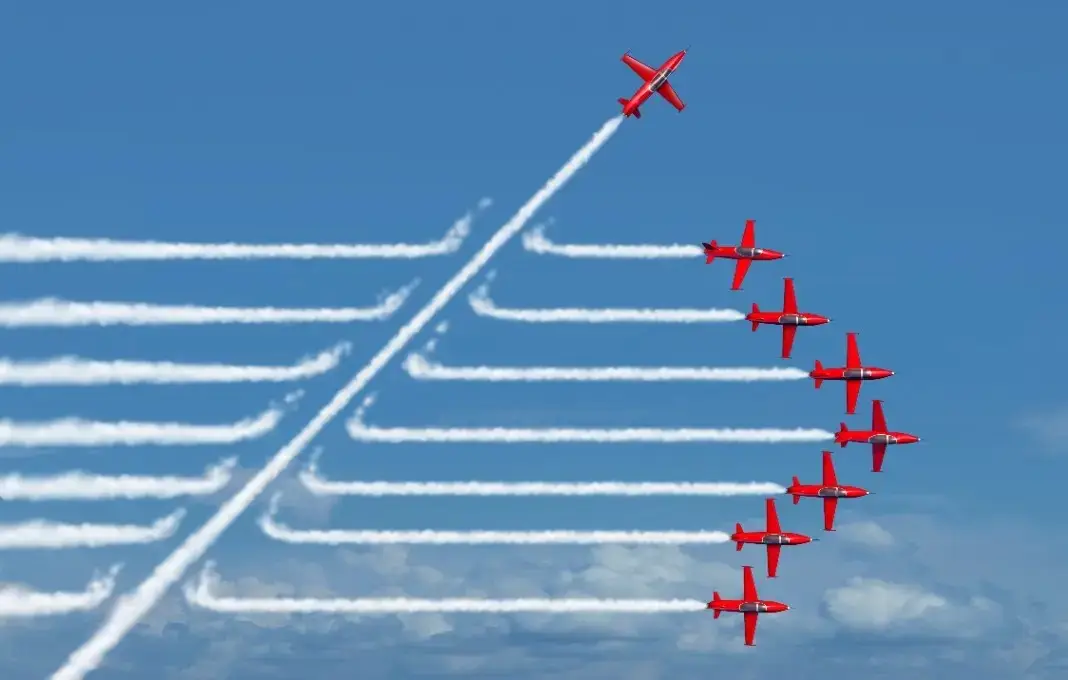 Airplane flying through flight path of other airplanes