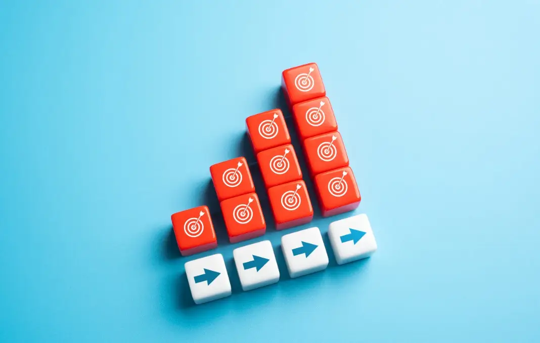 Blocks with bullseyes and arrows stacked on one another