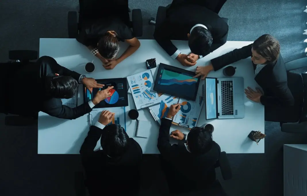 Top down aerial view of boardroom table
