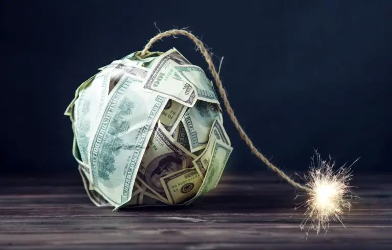 Bomb of money hundred dollar bills with a burning wick.